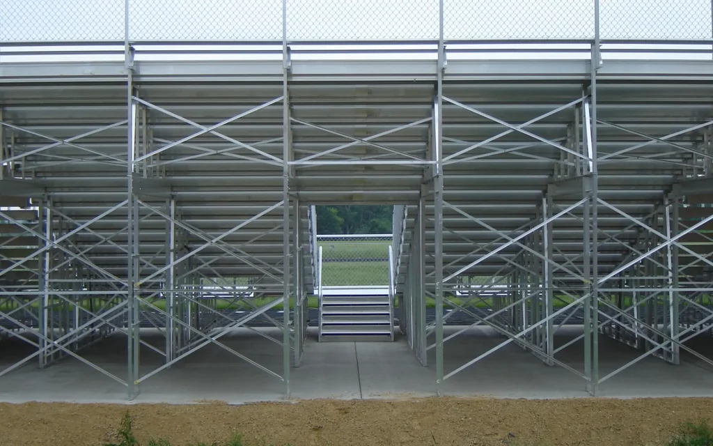 Underside view of outdoor elevated bleachers from back.
